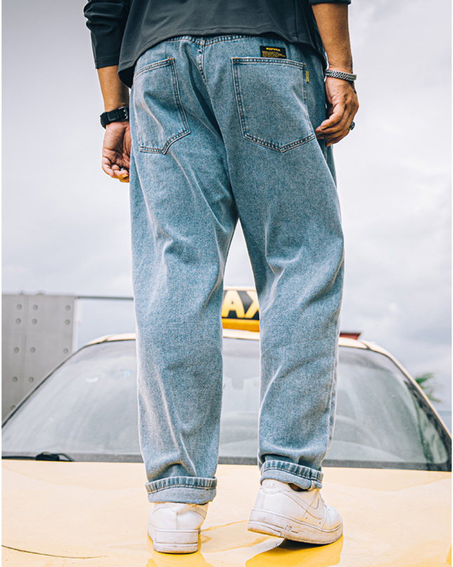 Plus size stretch denim jeans for men fits up to 331 lbs Straight-leg washed jeans for big and tall men Gray and blue elastic waistband denim pants for plus size